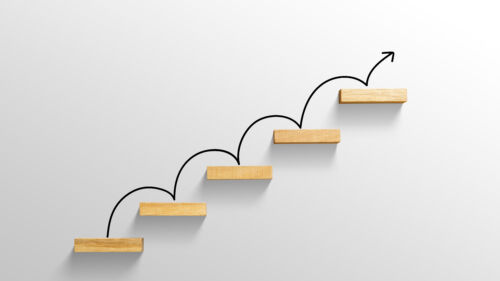Rising,Arrow,On,Staircase,,Increasing,Business