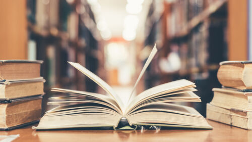 Education,Learning,Concept,With,Opening,Book,Or,Textbook,In,Old