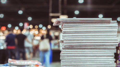 Stack,Of,Books,On,Table,In,Book,Festival,,Learning,And