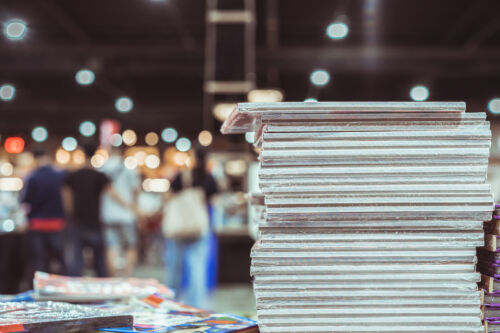 Stack,Of,Books,On,Table,In,Book,Festival,,Learning,And